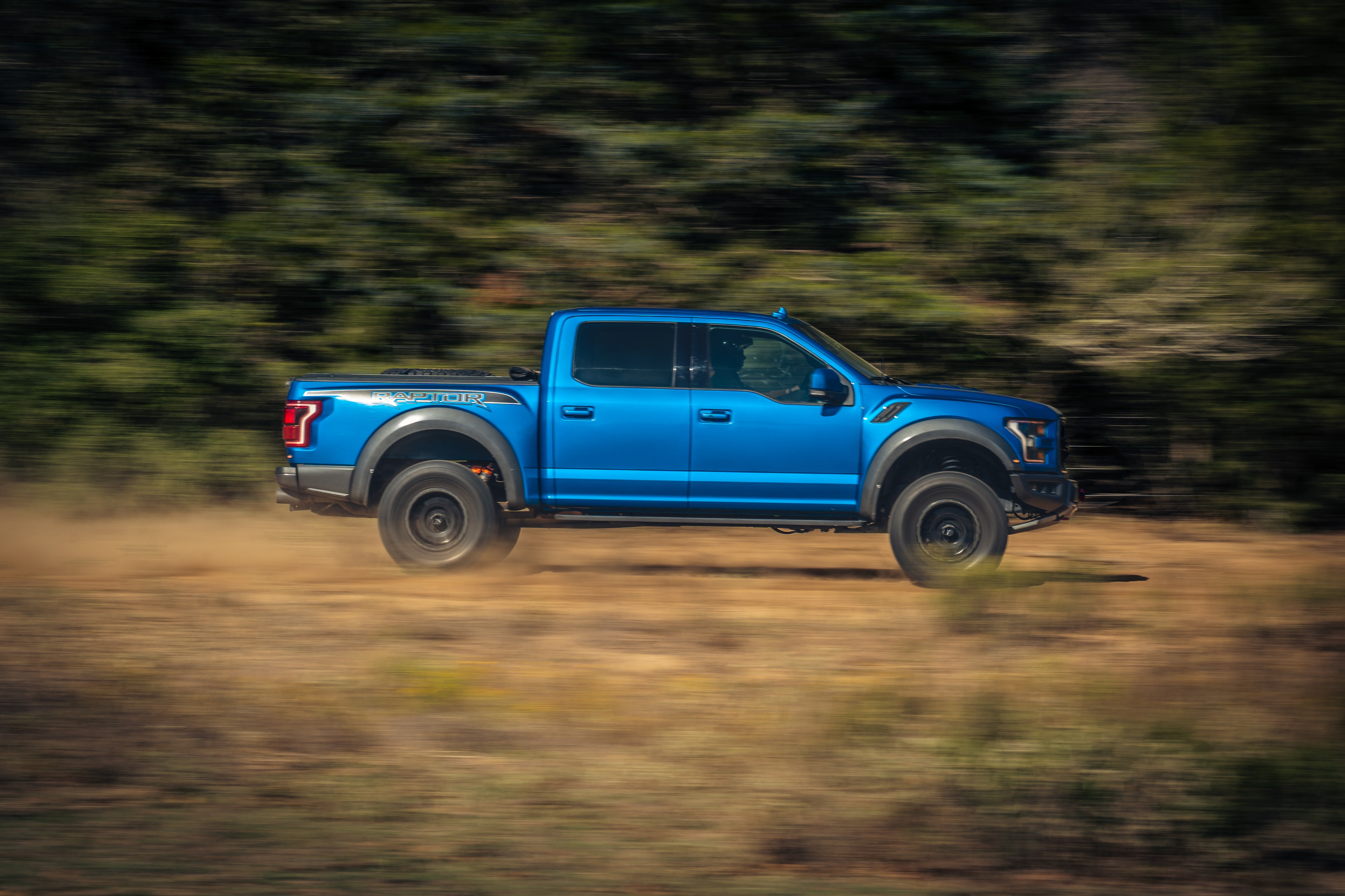 Ford Raptor speed run — clean side profile blur